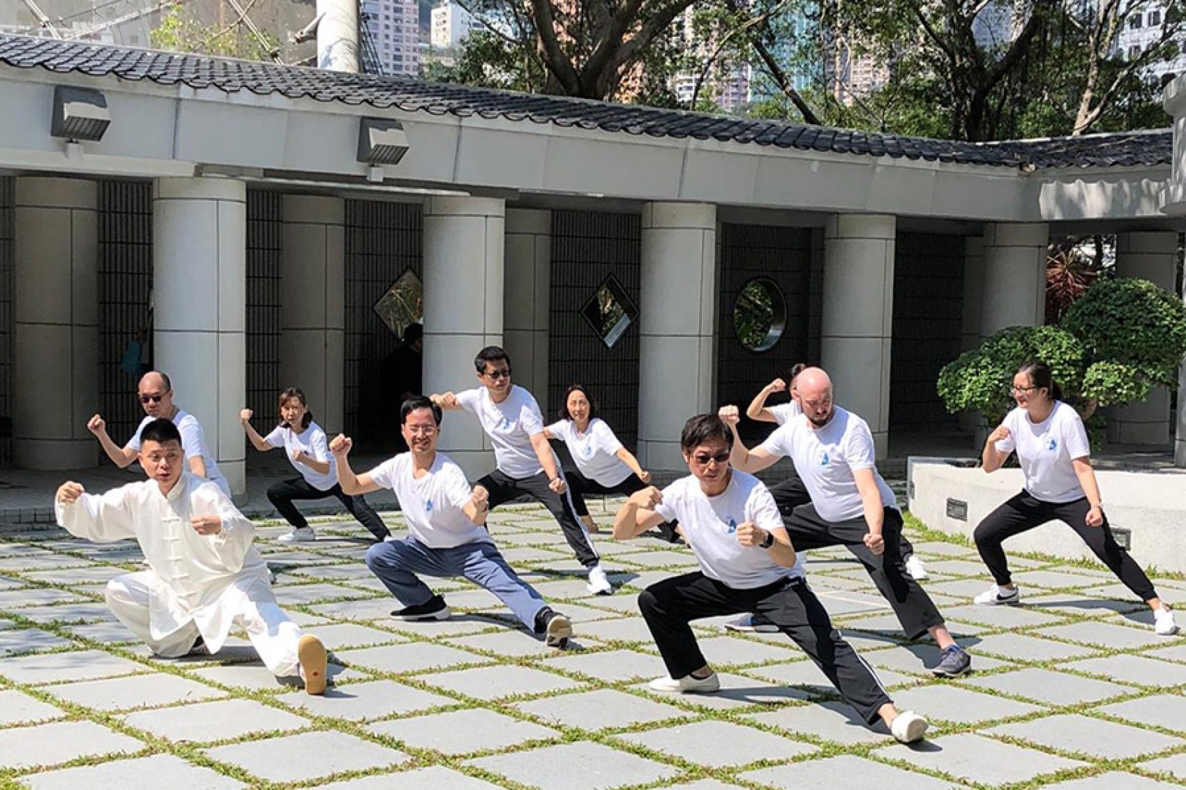 A class doing tai chi together with Chen Style Tai Chi Institute